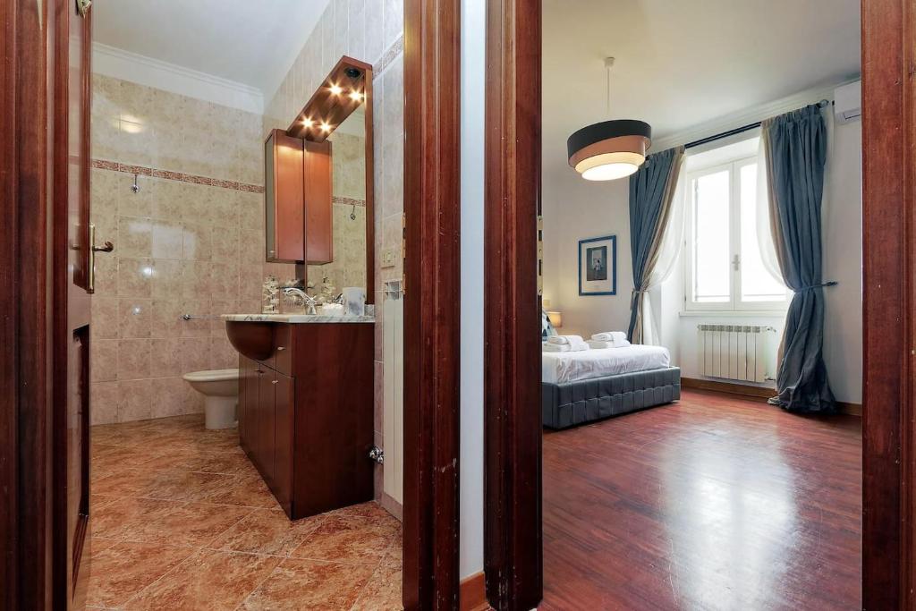 Kúpeľňa v ubytovaní Colosseo Sunset Apartment
