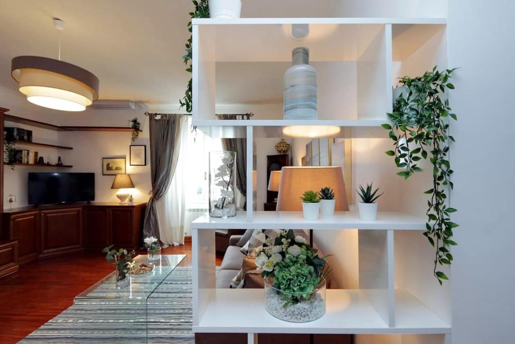 Kuchyňa alebo kuchynka v ubytovaní Colosseo Sunset Apartment