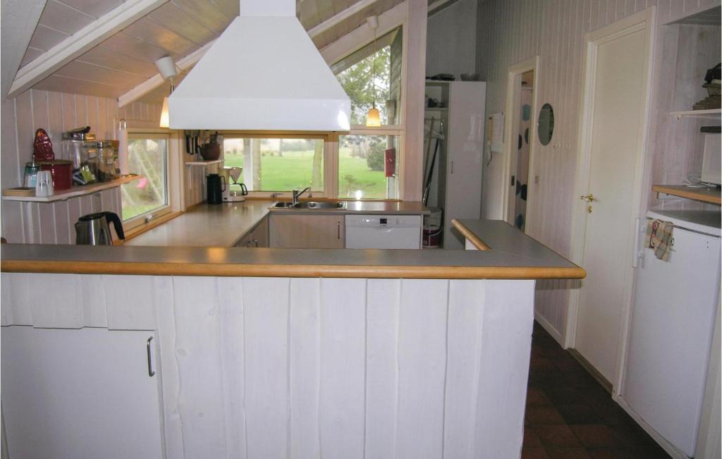 Kuchyň nebo kuchyňský kout v ubytování Holiday Home Laxtonvej Humble Denm