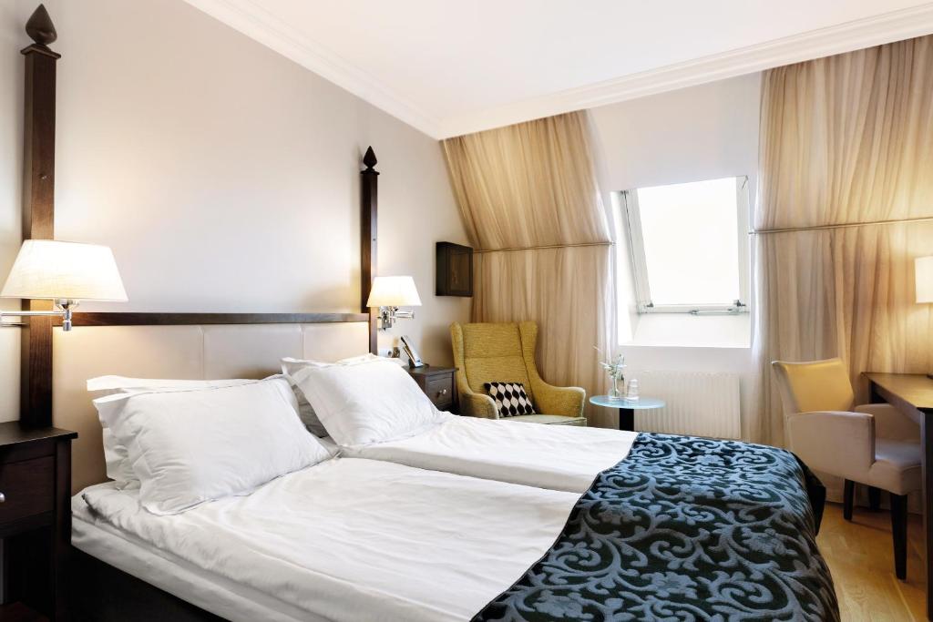 Postel nebo postele na pokoji v ubytování Elite Grand Hotel Norrköping