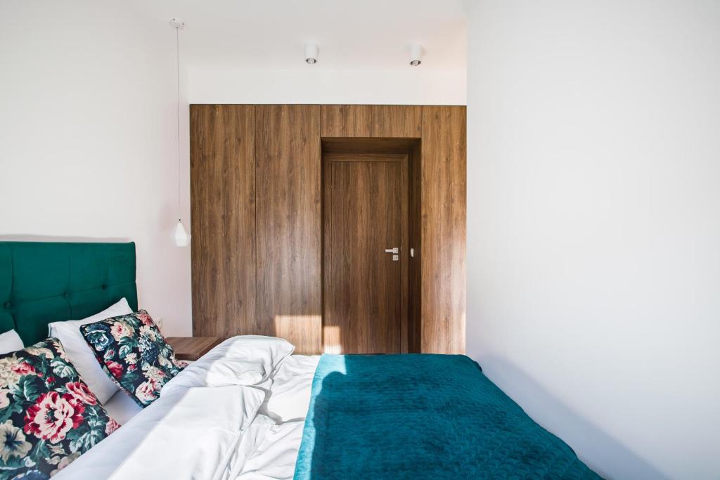 Posteľ alebo postele v izbe v ubytovaní Homewell Apartments Dominikańska