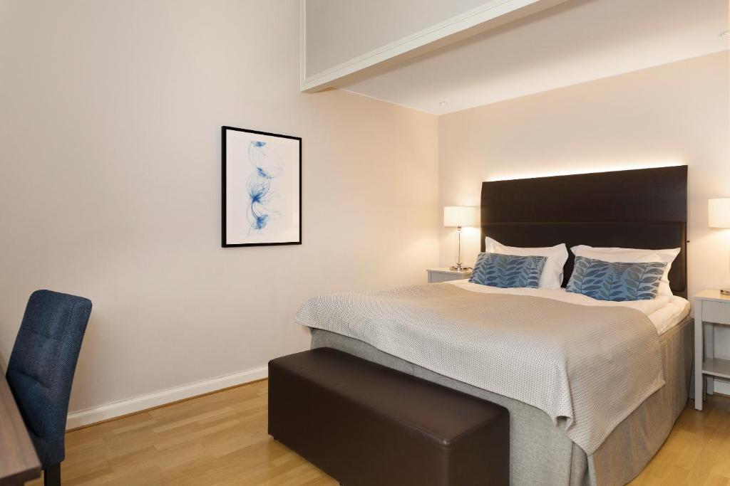 Postel nebo postele na pokoji v ubytování Elite Grand Hotel Norrköping