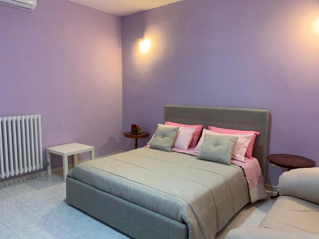 Postel nebo postele na pokoji v ubytování Albergo Lamanna Hotel digitale