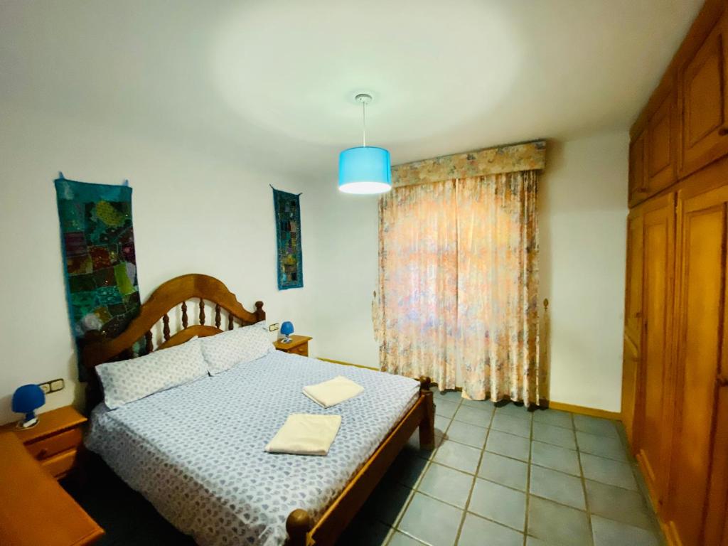 Postel nebo postele na pokoji v ubytování Barranco de la Salud