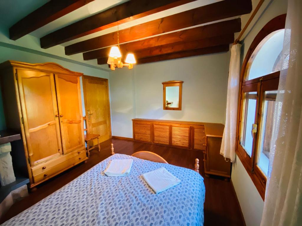 Postel nebo postele na pokoji v ubytování Barranco de la Salud