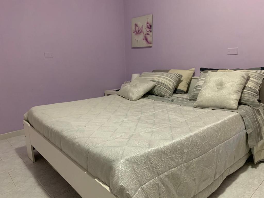 Postel nebo postele na pokoji v ubytování Albergo Lamanna Hotel digitale