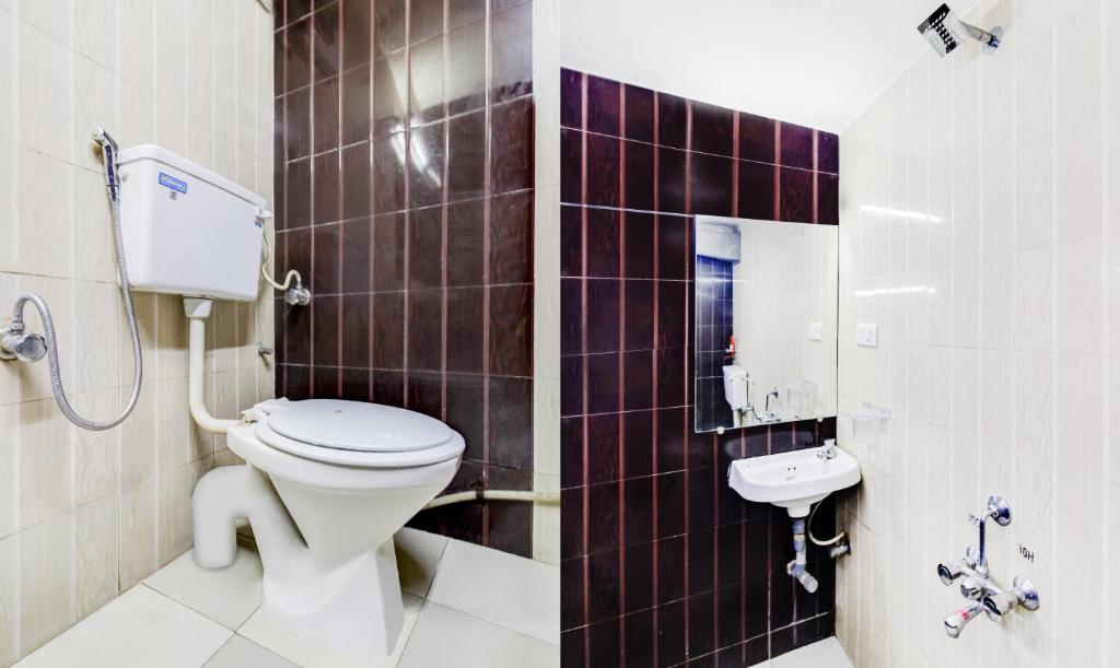 Koupelna v ubytování Itsy Hotels Aditya
