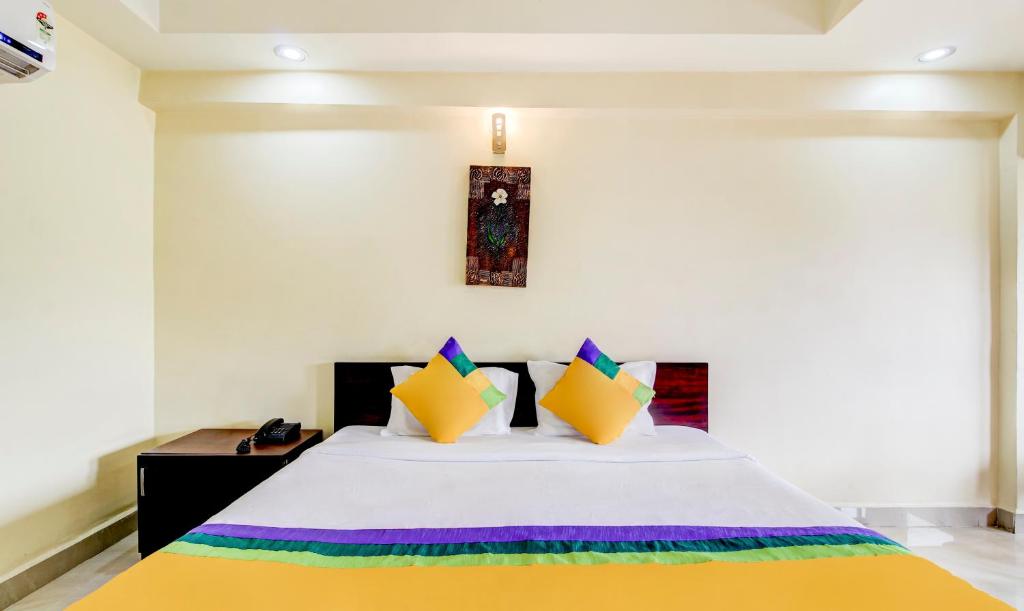 Postel nebo postele na pokoji v ubytování Itsy Hotels Aditya