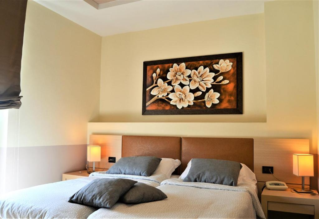 Postel nebo postele na pokoji v ubytování Domus Park Hotel & SPA