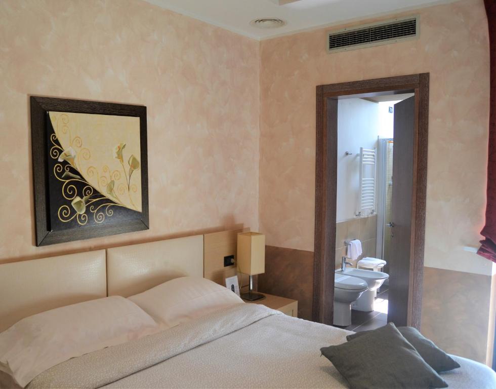 Postel nebo postele na pokoji v ubytování Domus Park Hotel & SPA