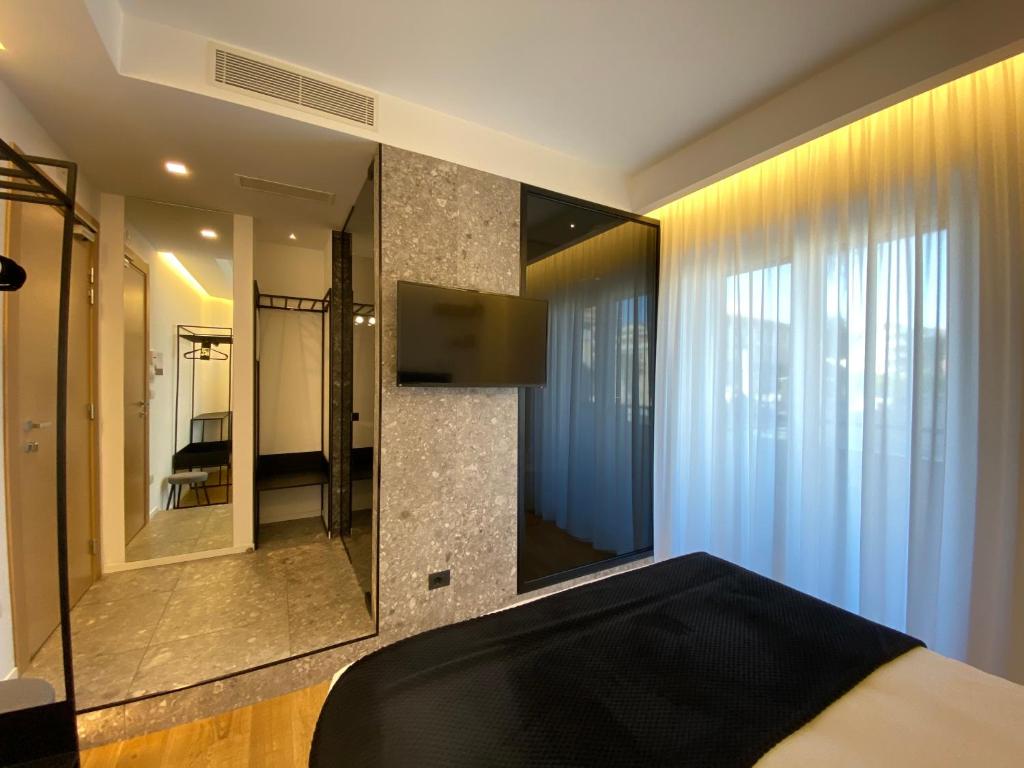 Postel nebo postele na pokoji v ubytování MYHOME 75 Premium Luxury B&B