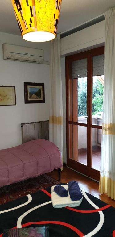 Posteľ alebo postele v izbe v ubytovaní Civico 22 Pisa