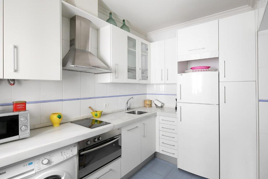Kuchyňa alebo kuchynka v ubytovaní Veoapartment Alameda Penthouse