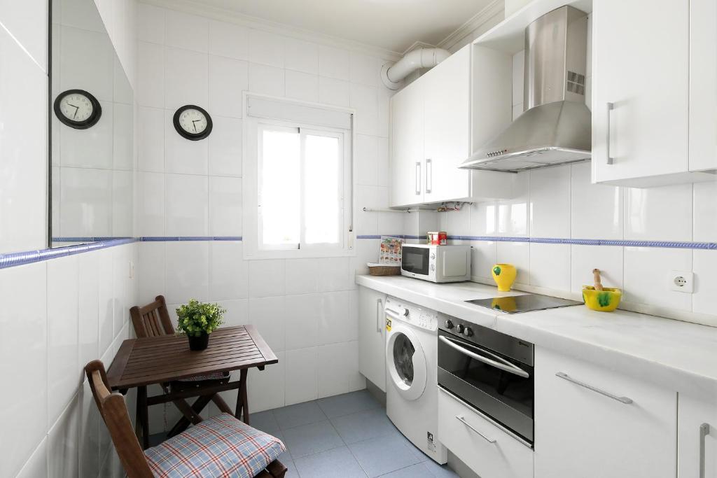 Kuchyňa alebo kuchynka v ubytovaní Veoapartment Alameda Penthouse