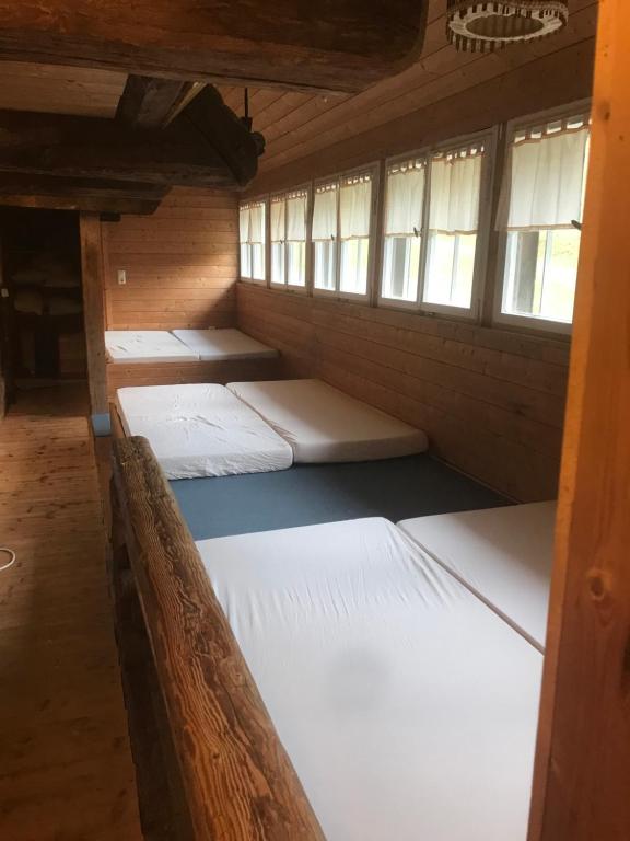 Postel nebo postele na pokoji v ubytování Stollenbacher Hütte auf 1092m