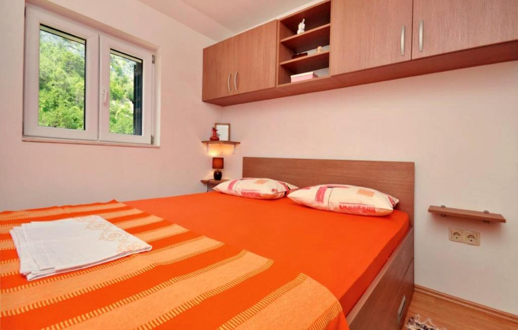 Posteľ alebo postele v izbe v ubytovaní Holiday Home with a Private Pool