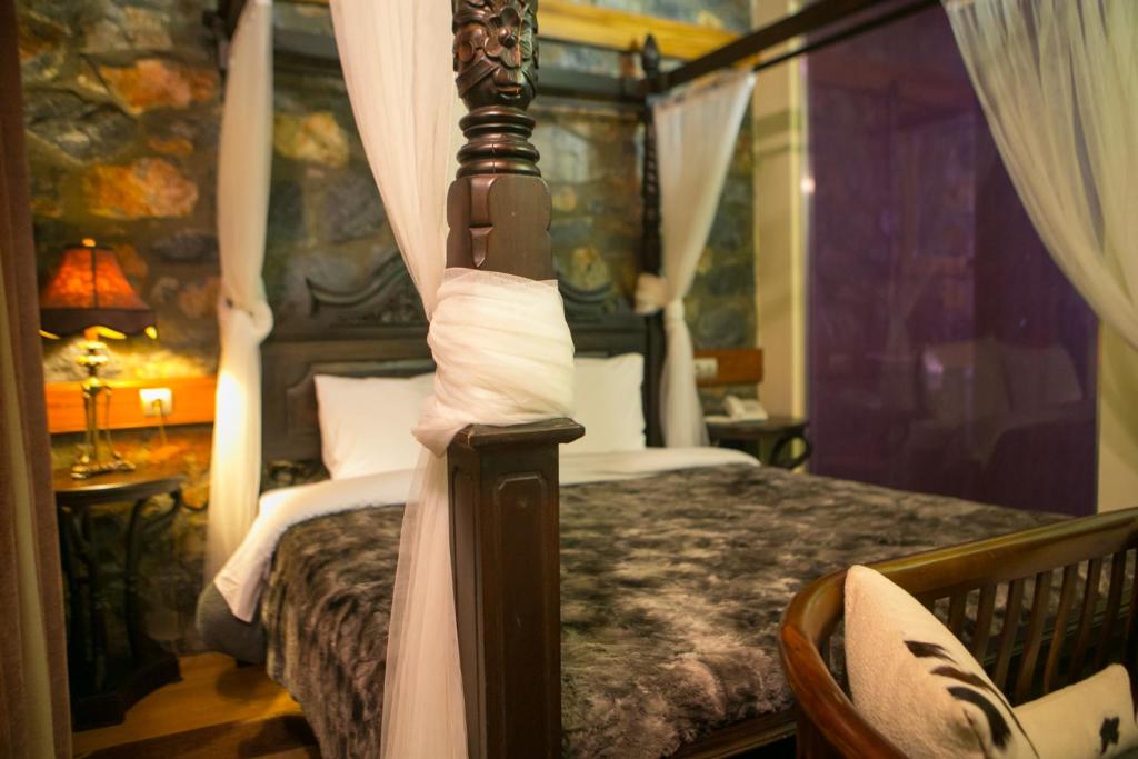 Postel nebo postele na pokoji v ubytování Montecristo Chalet