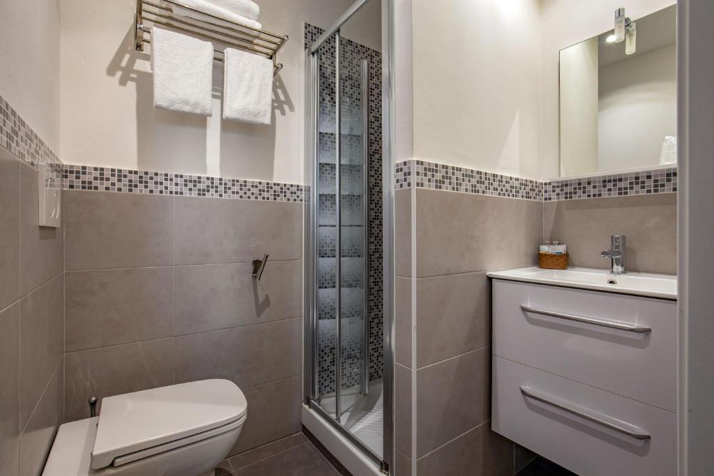 Kúpeľňa v ubytovaní Prima Guest House Collection