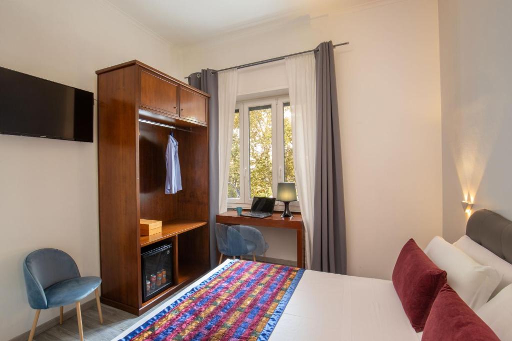 Posteľ alebo postele v izbe v ubytovaní Prima Guest House Collection