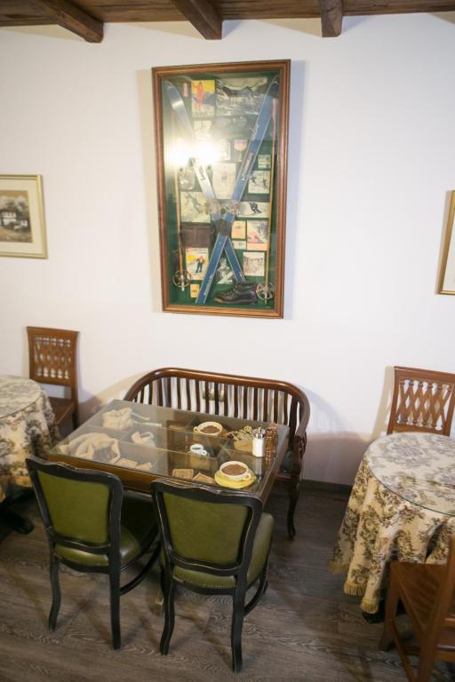 Posezení v ubytování Montecristo Chalet