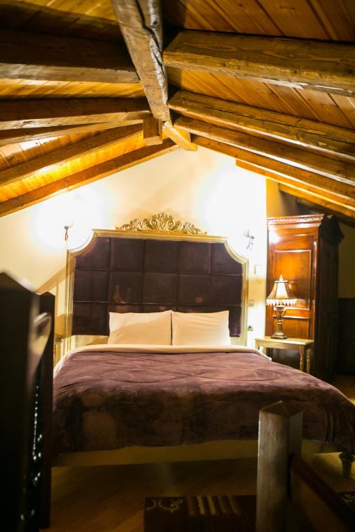 Postel nebo postele na pokoji v ubytování Montecristo Chalet
