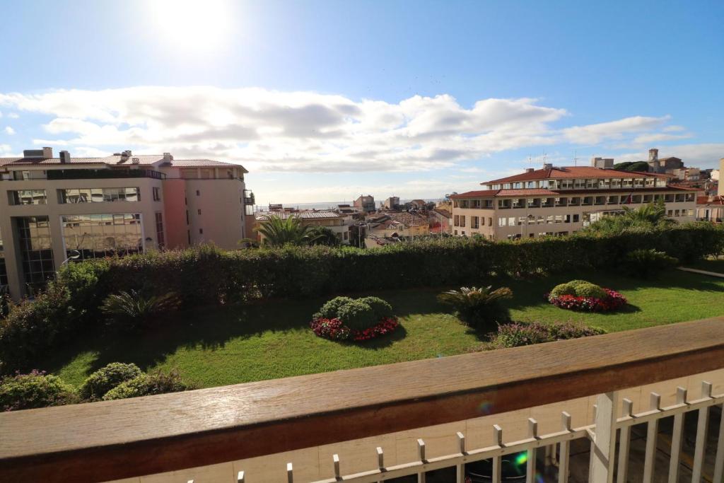 a view of a city from a balcony at 2, 3 and 4 bedroom sea view Forville Apartments 5 mins from the Palais in Cannes
