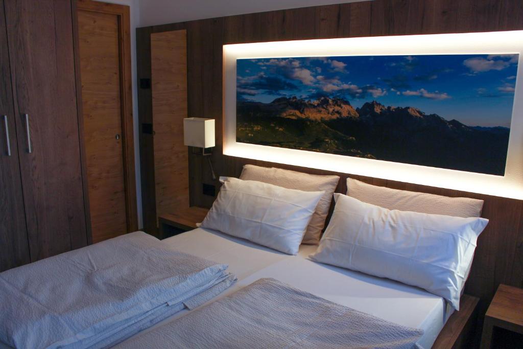 Postel nebo postele na pokoji v ubytování Edelweiss Alpine Nature