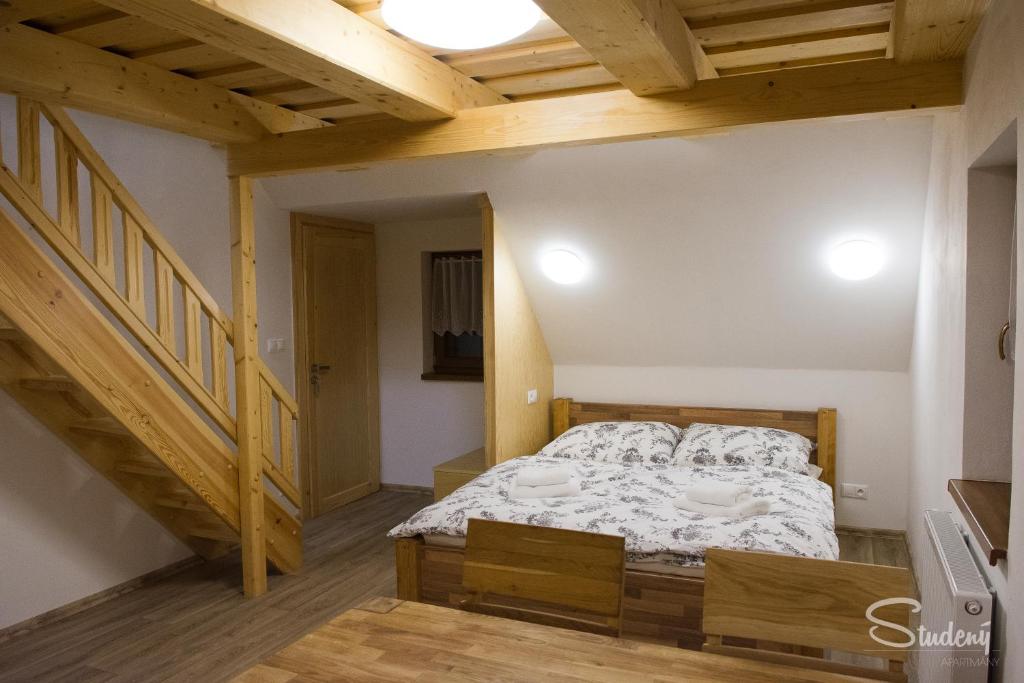 Postel nebo postele na pokoji v ubytování Apartmány Studený