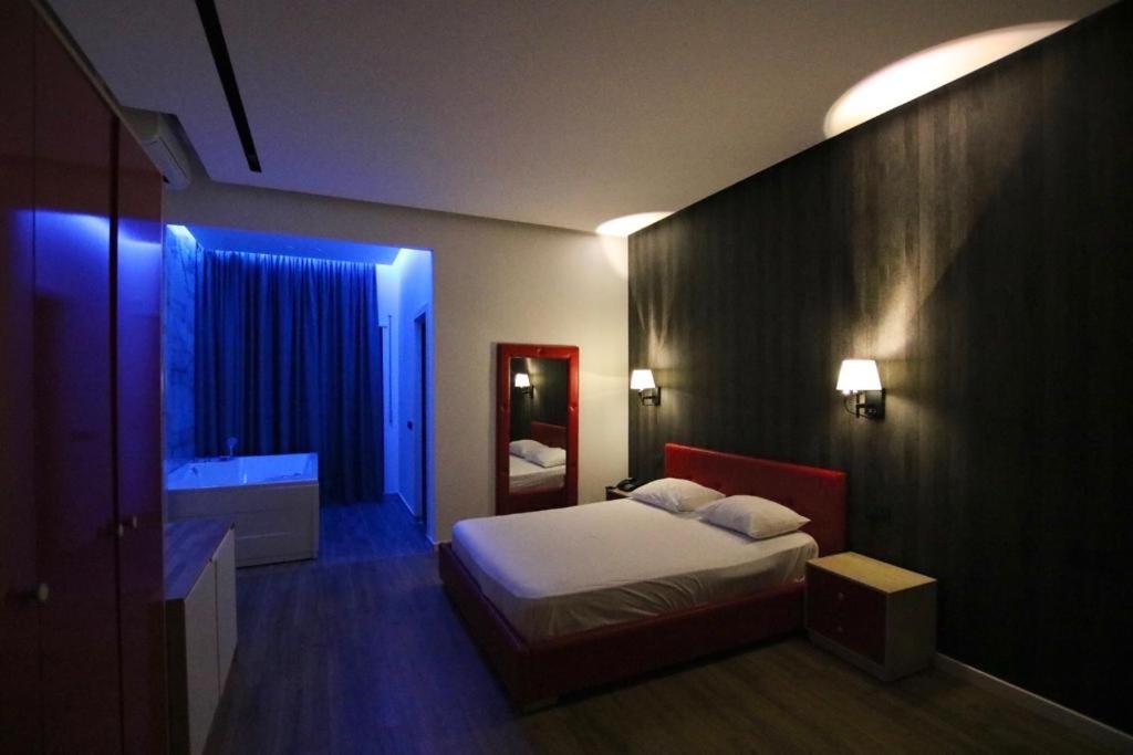 Cama o camas de una habitación en Aurelis Hotel