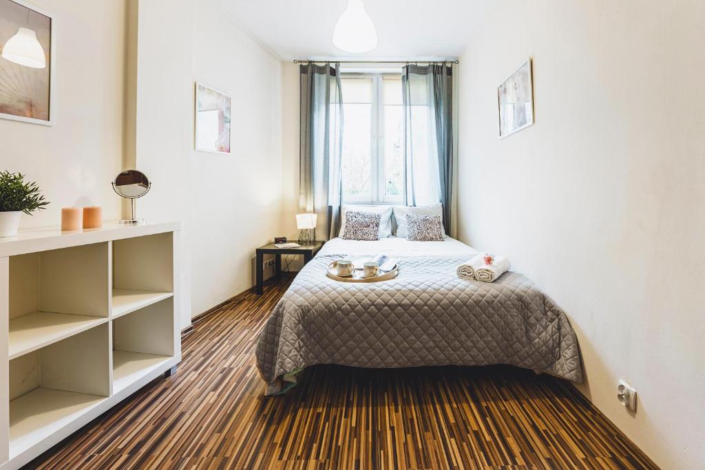 Кровать или кровати в номере Apartament Niecała Prince Deluxe