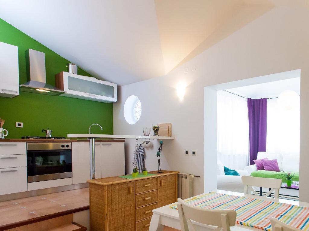 Kuchyň nebo kuchyňský kout v ubytování Sun Garden Premium Apartments