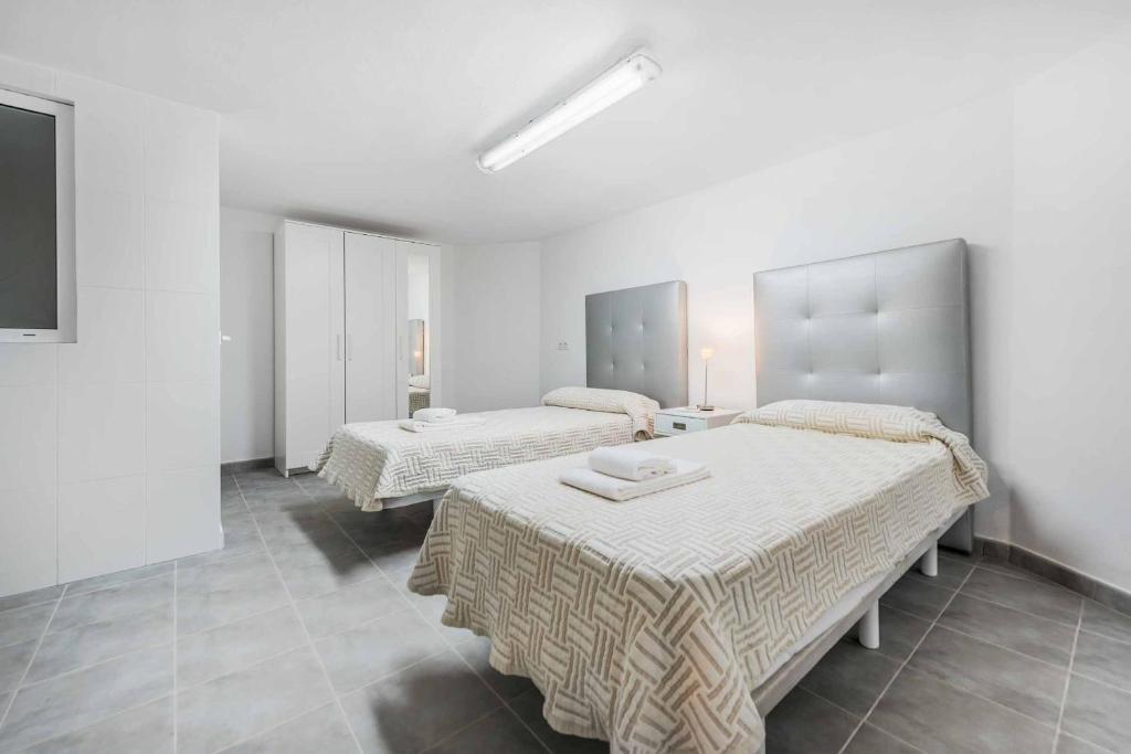 Postel nebo postele na pokoji v ubytování Villa Marioma