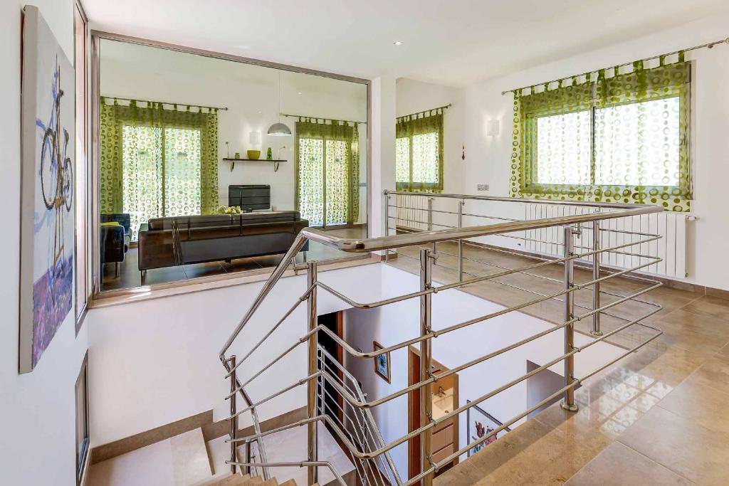 Postel nebo postele na pokoji v ubytování Villa Marioma