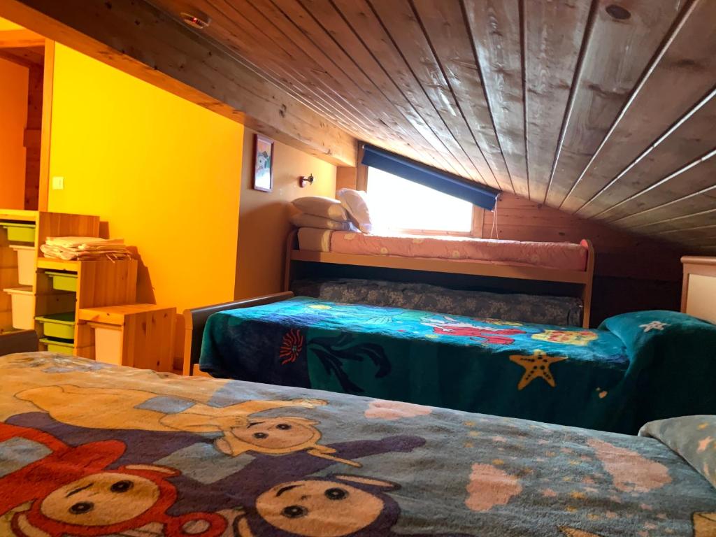 Postel nebo postele na pokoji v ubytování MAIANS - Peu del Riu 122 - Vall d'Incles - Soldeu