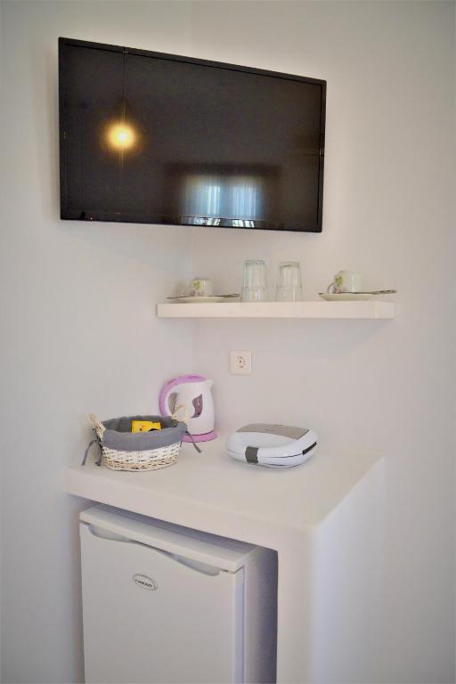 Kuchyň nebo kuchyňský kout v ubytování Dioni lux inn