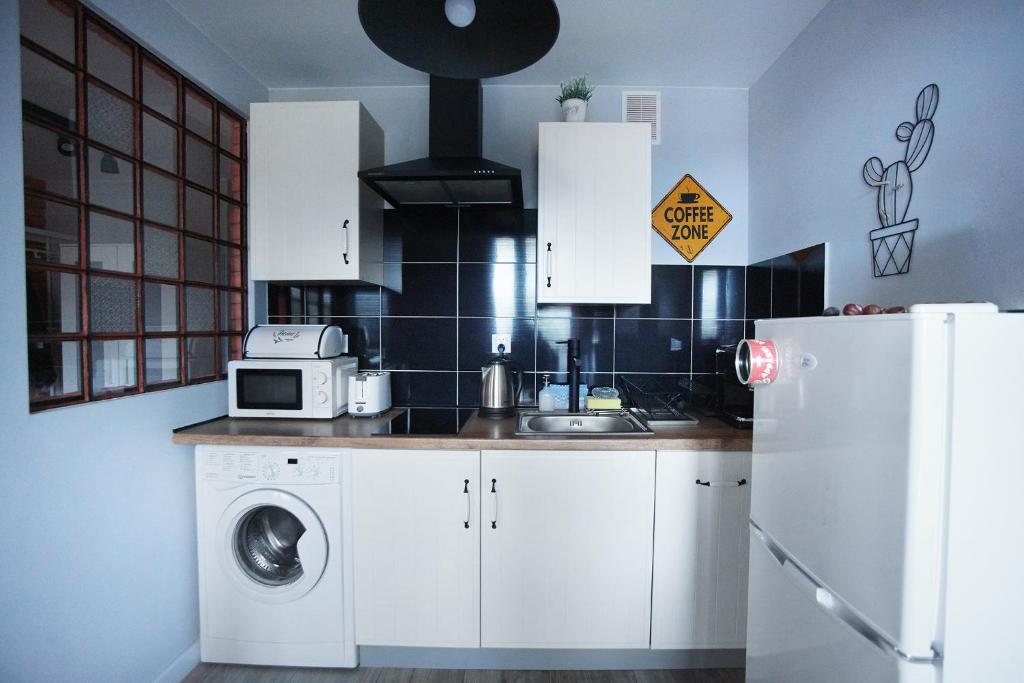 Kuchyňa alebo kuchynka v ubytovaní Apartament Zdrojowy