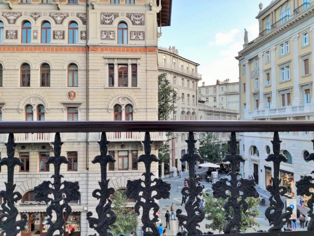 a view from a balcony of a building at Trieste Center Rooms & Apartments - Fiori di Trieste in Trieste