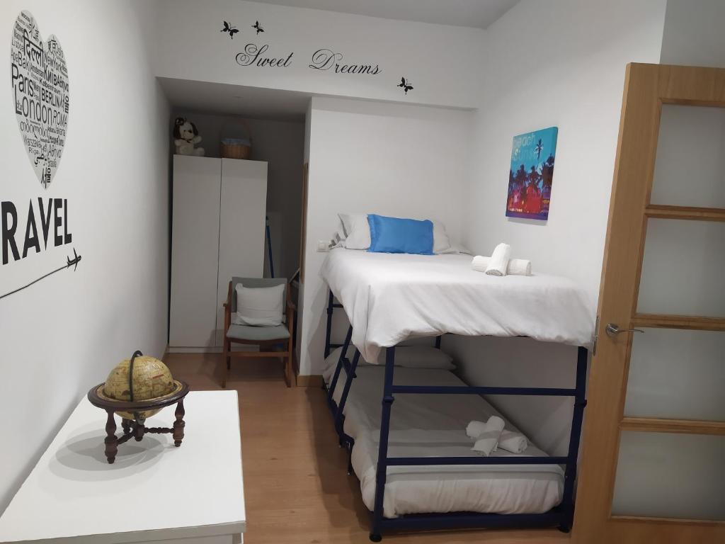 Postel nebo postele na pokoji v ubytování Apartamento Gabierrota