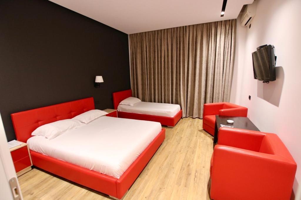 Cama o camas de una habitación en Aurelis Hotel