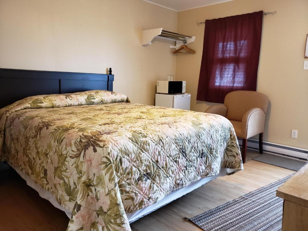 Postel nebo postele na pokoji v ubytování Regent Motel