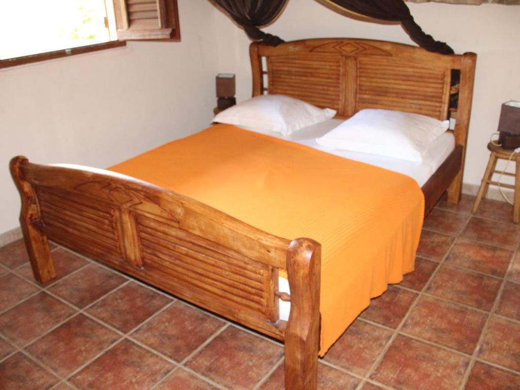 Postel nebo postele na pokoji v ubytování RESIDENCE LA TAUPINE MANDARINE