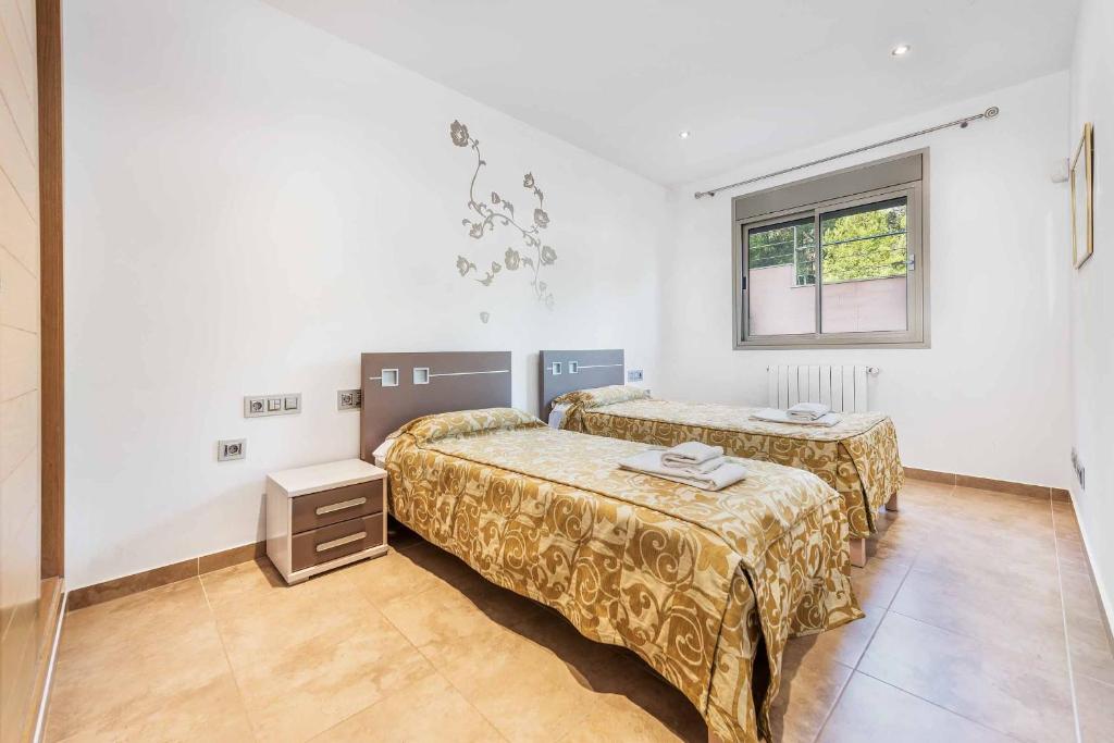 Postel nebo postele na pokoji v ubytování Villa Marioma