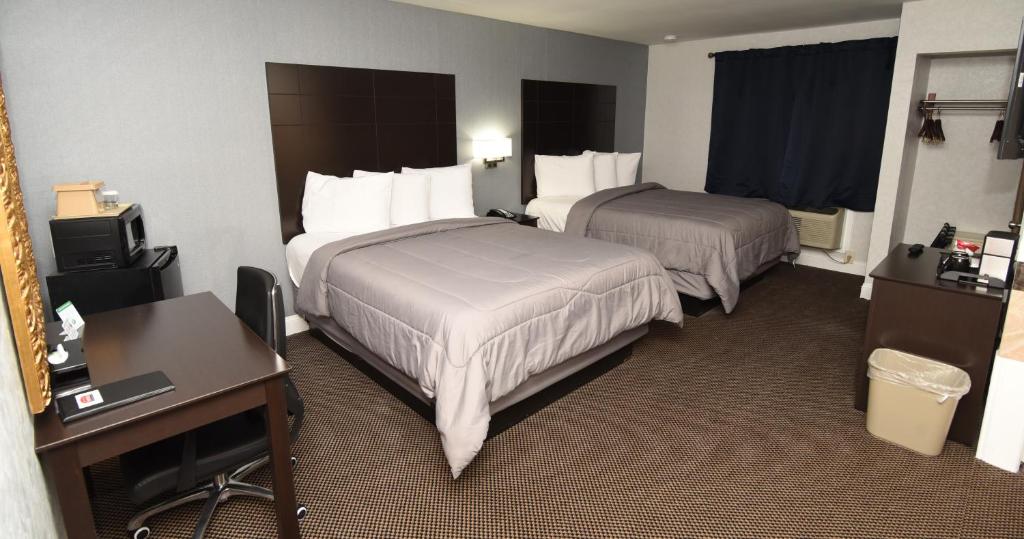 Postel nebo postele na pokoji v ubytování FairBridge Hotel Atlantic City