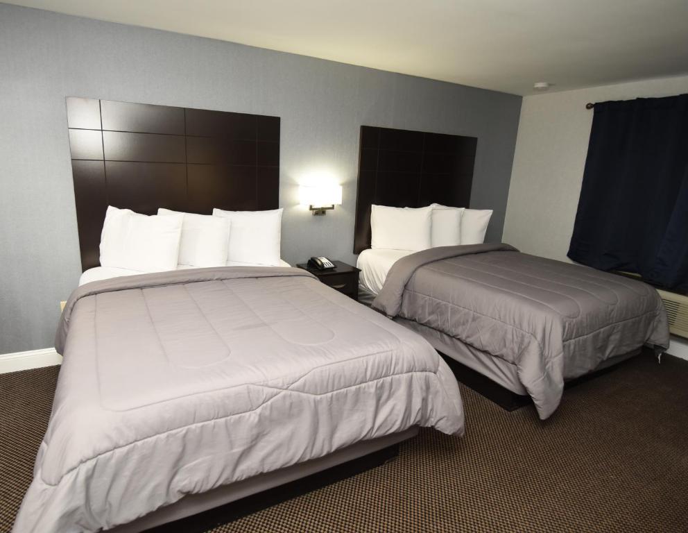 Postel nebo postele na pokoji v ubytování FairBridge Hotel Atlantic City