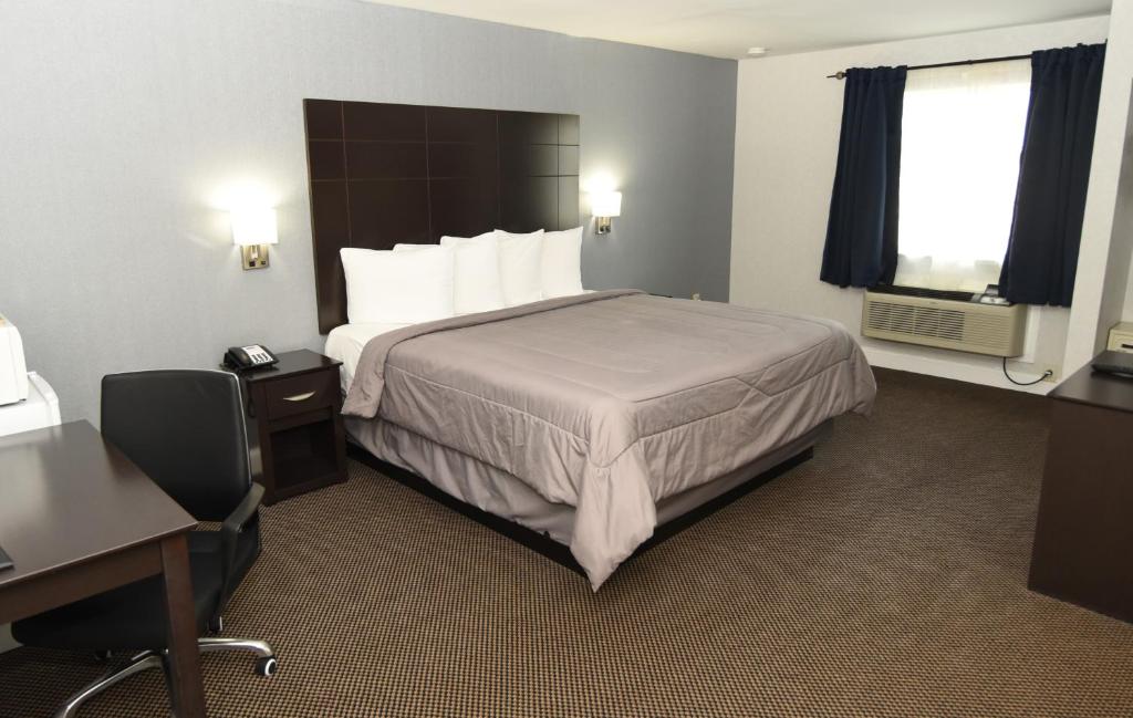 Postel nebo postele na pokoji v ubytování FairBridge Hotel Atlantic City
