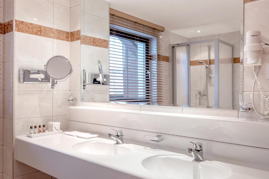 Koupelna v ubytování Hotel Angerer Alm