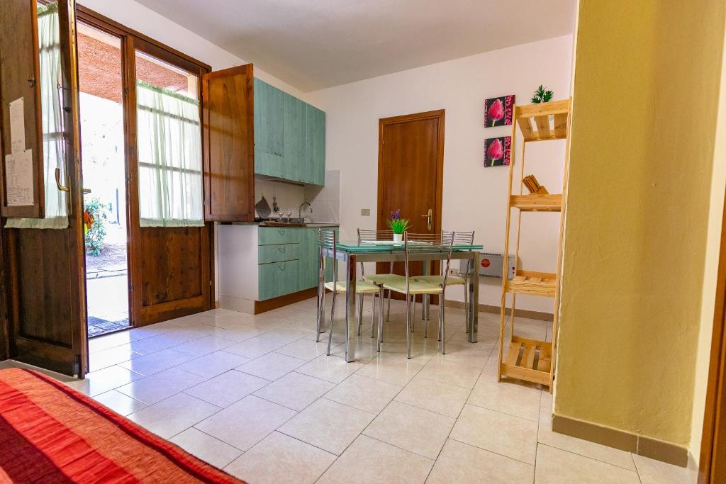Residence Ristorante Il Paradiso - One-Bedroom Apartment With Garden - Ground Floor