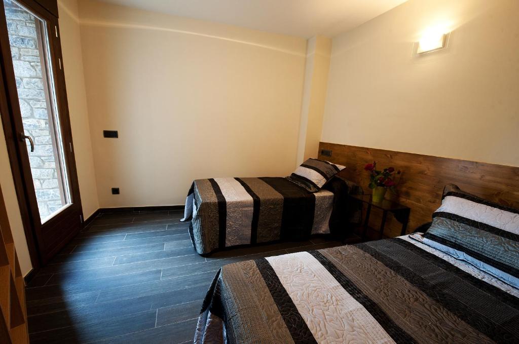 Posteľ alebo postele v izbe v ubytovaní Casa Llop