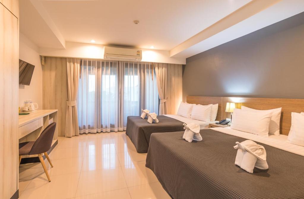 TV a/nebo společenská místnost v ubytování Lada Krabi Residence Hotel - SHA Plus