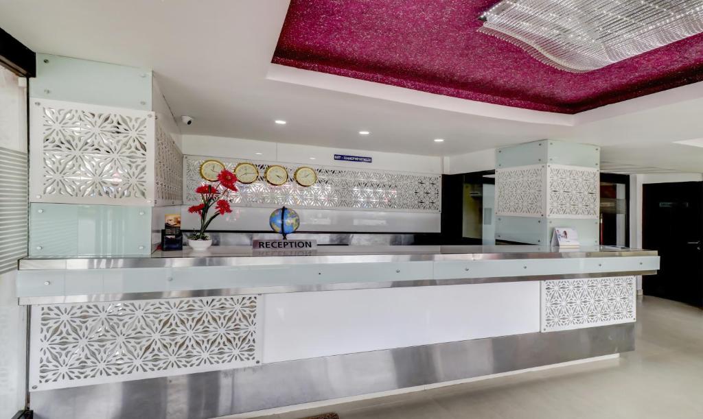 Kuchyň nebo kuchyňský kout v ubytování Hotel Luciya